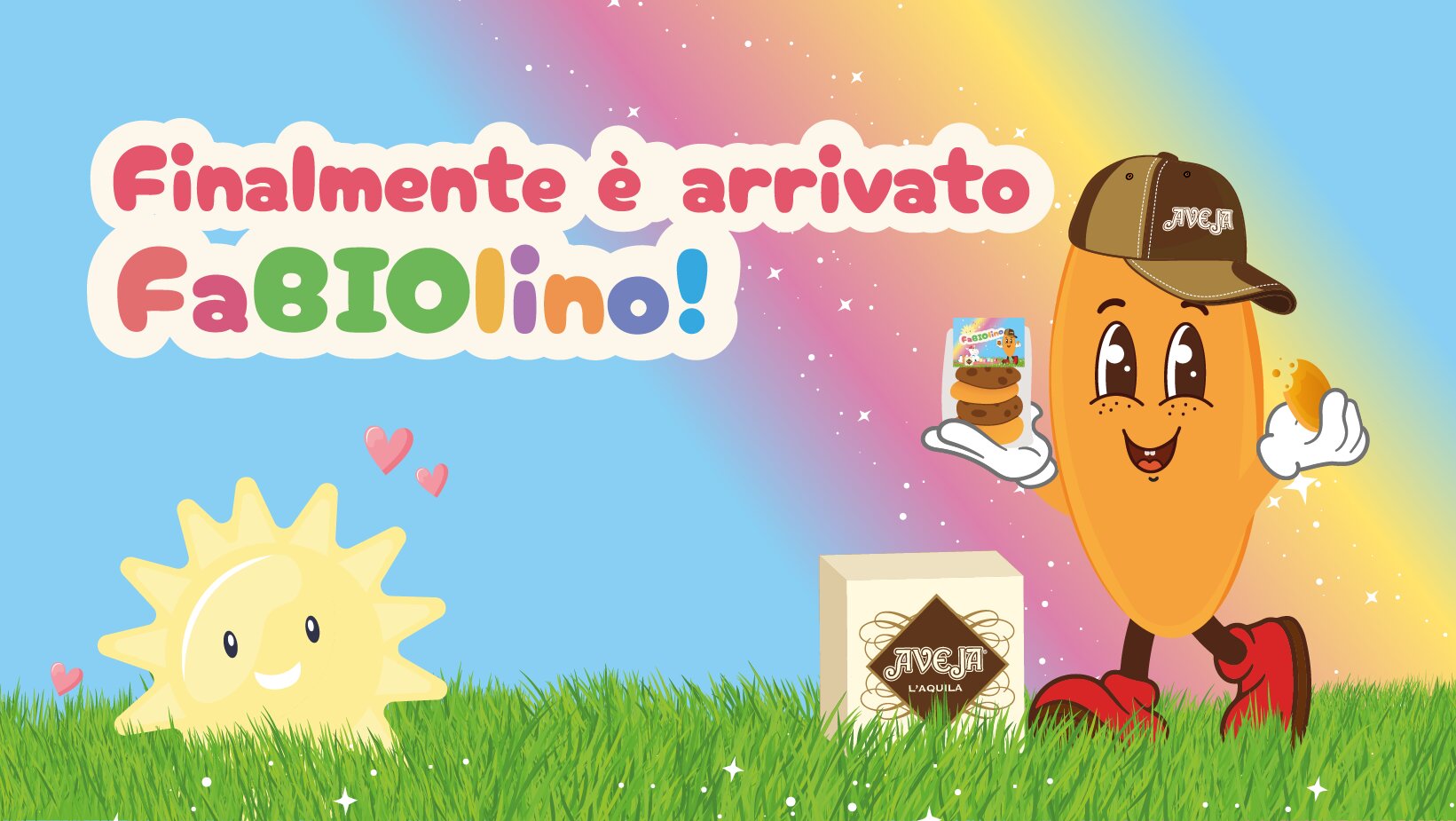 Finalmente è arrivato FaBIOlino! La mascotte con il cappellino Aveja sul prato sotto l'arcobaleno